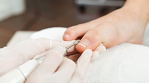 Dépose vernis pieds